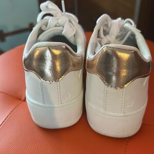 Cute White Shoes with gold heel.